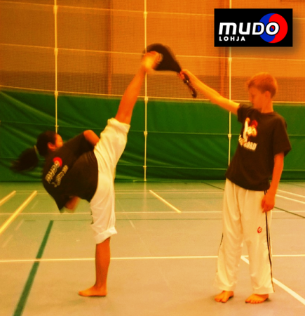 Treining kicks with brother Keni.